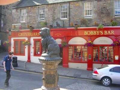 Bobby, the dog sat on master's grave for fourteen years.